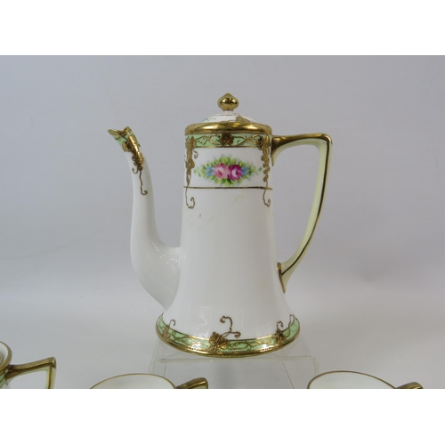 41 - Noritake Part coffee set hand painted and gilt design.