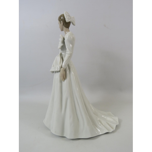 44 - Lladro figurine of a lady in a white wedding dress with bows, approx 11