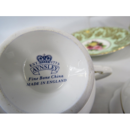 61 - 2 Paragon cabinet cups and saucer with Rose pattern centres plus one by Aynsley.