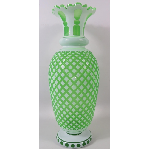 102 - Large Bohemian white and uranium glass vase possibly Moser. Slight nibble chips to the rim, 15 3/4