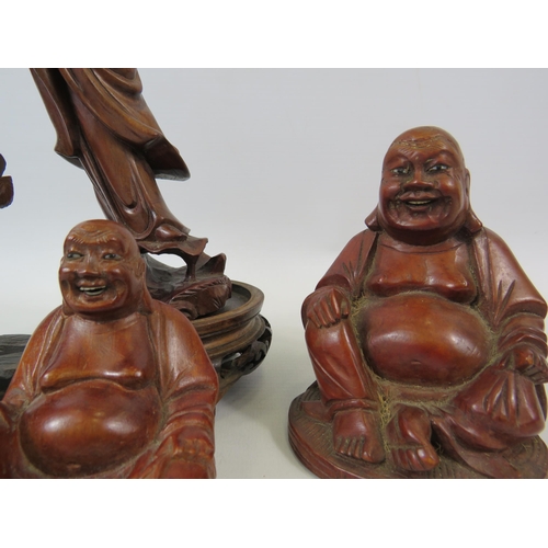 137 - Selection of oriental carved wood figures.