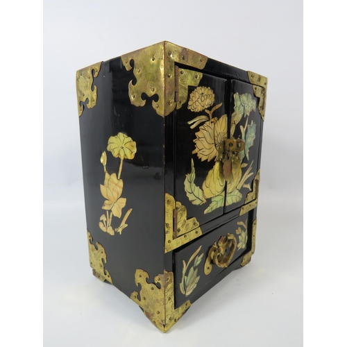 154 - Oriental jewellery box with mother of pearl inlay and brass fittings, approx 8 1/4