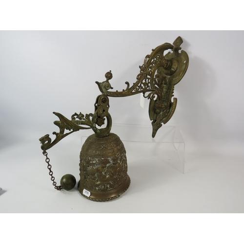 180 - Large out door brass bell with cherub detail.