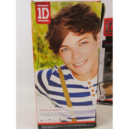 1601 - Three One Direction Singing Louis . All boxed and unused. Each 12 inches tall. See photos.