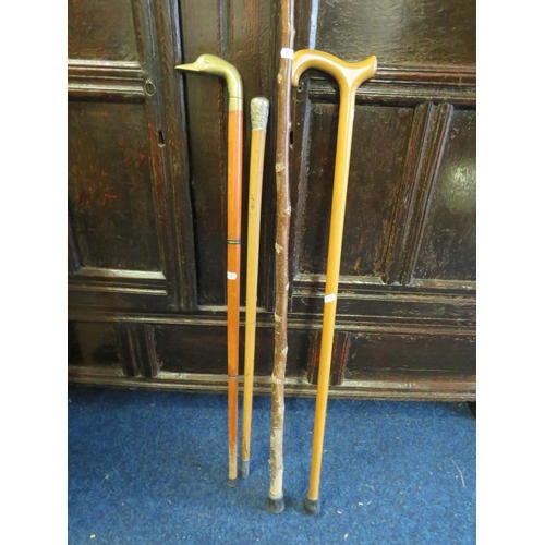 1965 - Four assorted walking sticks. See photos.  S2