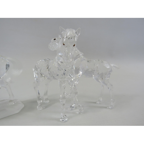 184 - 2 Swarovski Figurines Arabian Stallion and 2 Foals. The tallest measures 9cm.