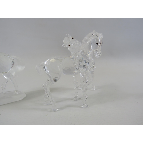 184 - 2 Swarovski Figurines Arabian Stallion and 2 Foals. The tallest measures 9cm.