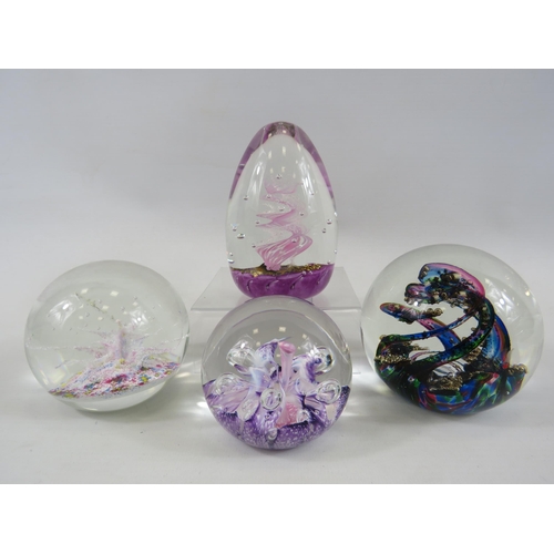 206 - 4 Selkirk glass paperweights.