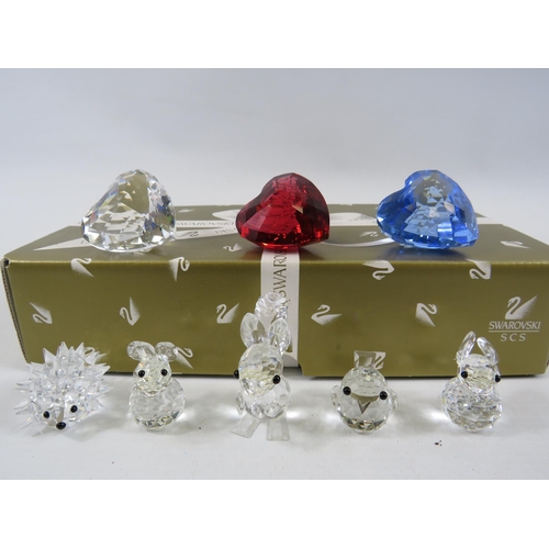 215 - 3 Swarovski crystal hearts and 5 small swarovski animal figures.