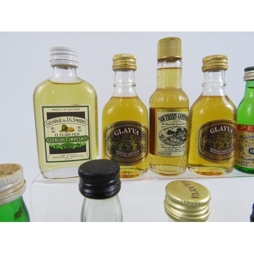 224 - Selection of vintage miniature whiskeys and wines.