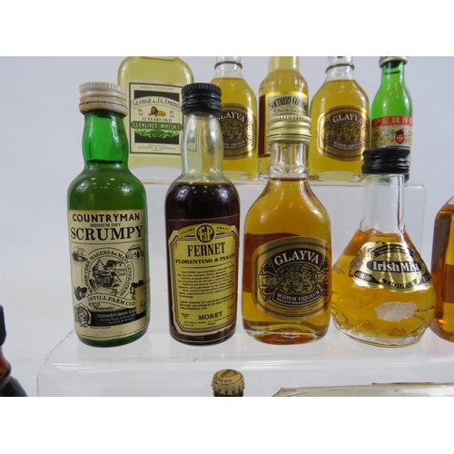 224 - Selection of vintage miniature whiskeys and wines.