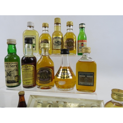 224 - Selection of vintage miniature whiskeys and wines.