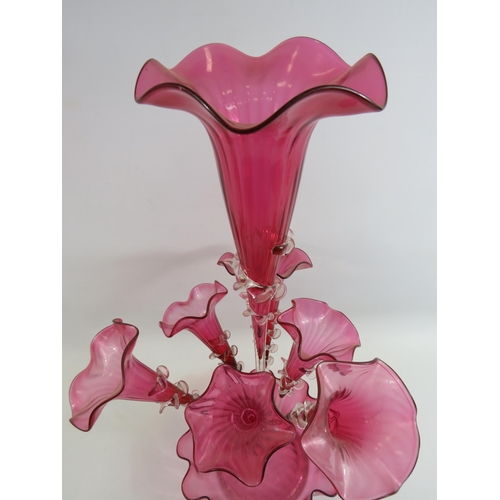 228 - Victorian cranberry glass epergne vase with 7 trumpets, approx 23