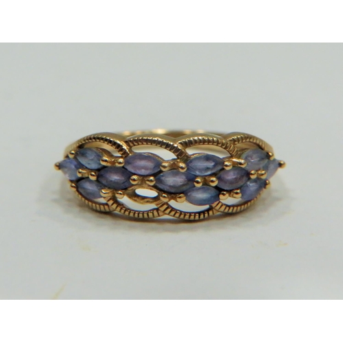 317 - 9ct Yellow Gold ring set with multiple Topaz.   Finger size 'P-5 to Q'   2.4g