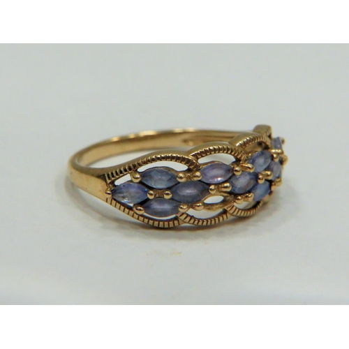 317 - 9ct Yellow Gold ring set with multiple Topaz.   Finger size 'P-5 to Q'   2.4g