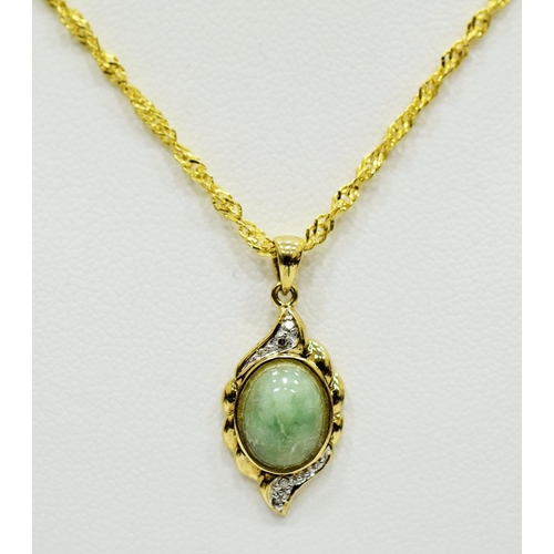 330 - 9ct Yellow Gold Pendant set with a Central Jade with Diamond surround. Hung on a 14ct fancy link 22 ... 