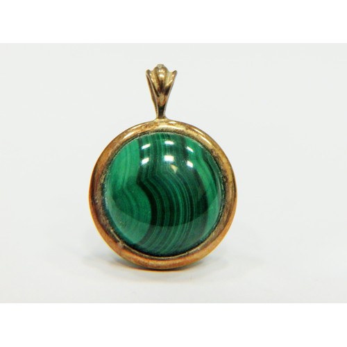 324 - Banded Malachite pendant set in a 9ct Yellow Gold Mount. Pendant measures approx 25mm long. See phot... 