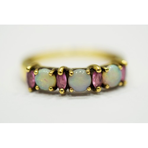 325 - 9ct Yellow Gold Ring set with Opal & Amethysts.  Finger size 'Q-5 to R'   2.4 g