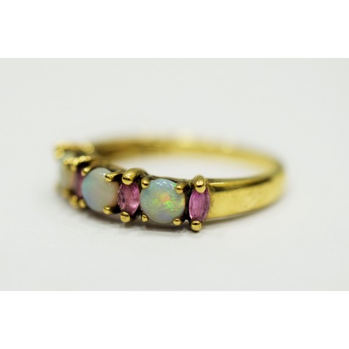 325 - 9ct Yellow Gold Ring set with Opal & Amethysts.  Finger size 'Q-5 to R'   2.4 g