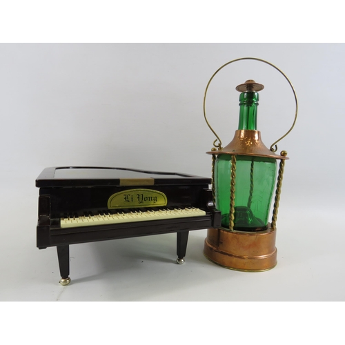 240 - Musical decanter in the form of a lantern and a musical jewellery box in the form of a piano.