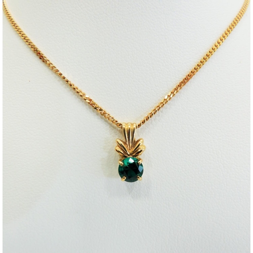 334 - 9ct Yellow Gold Emerald coloured Circular CZ set pendant hung upon an 18 inch chain.  Total Weight  ... 