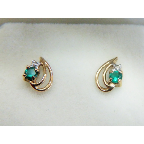 335 - Pair of 9ct Yellow Gold double loop ear studs,  each set with a small circular Emerald coloured CZ s... 