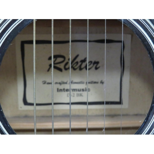 652 - Rikter Six string Accoustic guitar by intermusic. D-2 BK.   See photos.