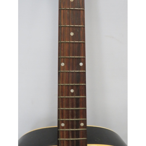 652 - Rikter Six string Accoustic guitar by intermusic. D-2 BK.   See photos.