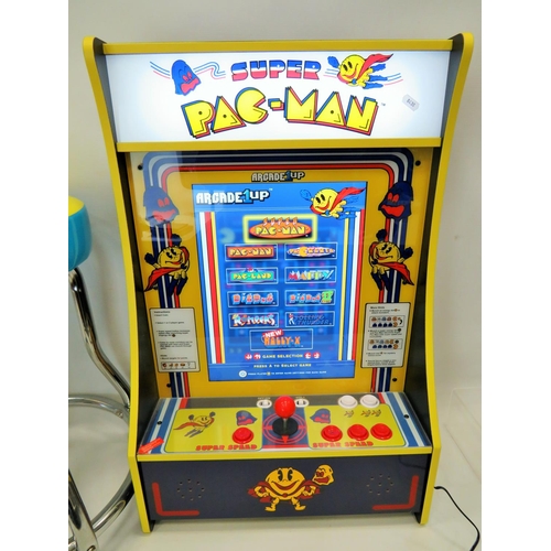 654 - Super Pac-Man Home arcade game in excellent and working condition. Comes with unused Pac-man Chrome ... 