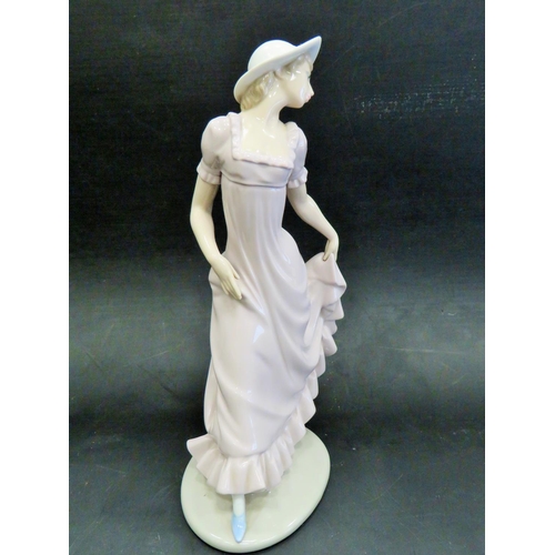 14 - Large nao Figurine by Lladro  'Girl in a hat with Pink Dress'   Measures  11.5 inches.  Excellent co... 