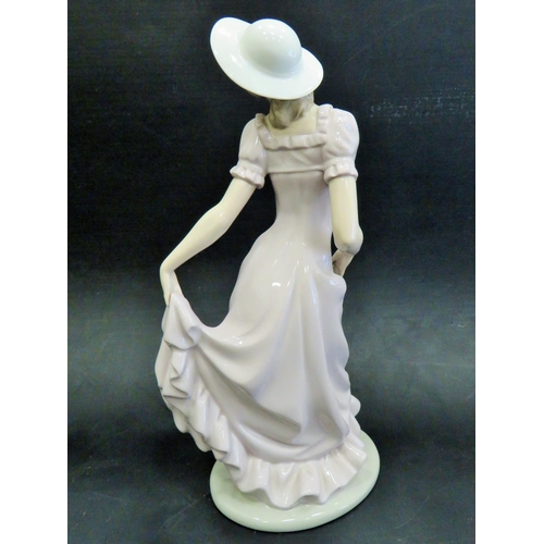 14 - Large nao Figurine by Lladro  'Girl in a hat with Pink Dress'   Measures  11.5 inches.  Excellent co... 