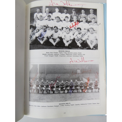 51 - Official History of Scunthorpe United Football Club containing lots of autographed pages together wi... 