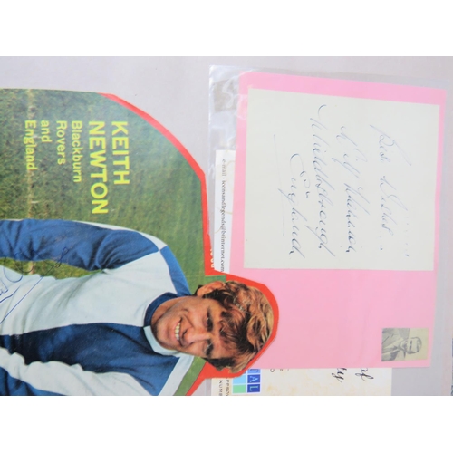 66 - Two interesting and well filled football related scrapbooks containing many autographed pictures and... 