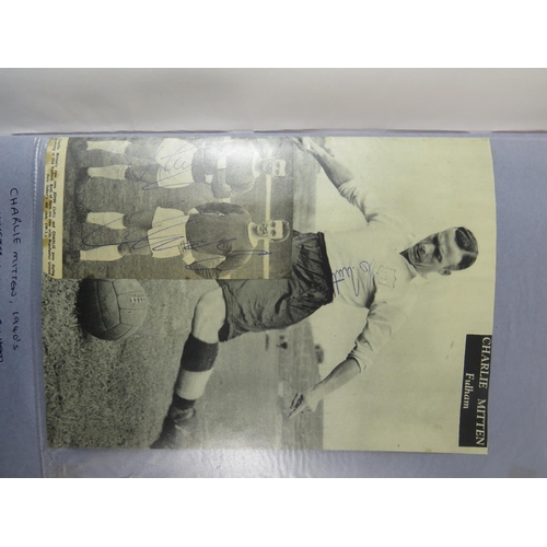 66 - Two interesting and well filled football related scrapbooks containing many autographed pictures and... 