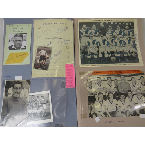 67 - Two interesting and well filled football related scrapbooks containing many autographed pictures and... 