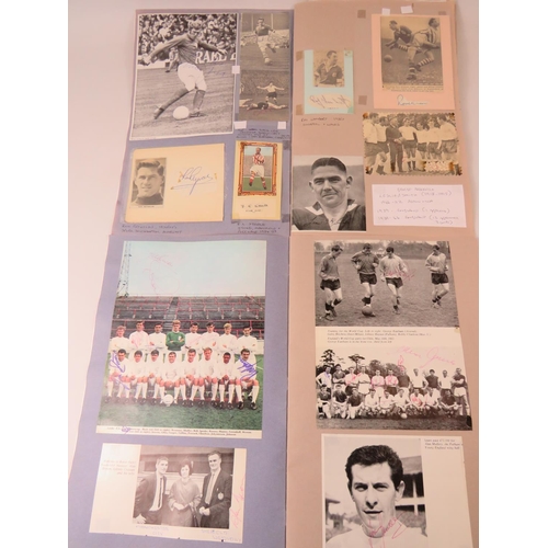 68 - Two interesting and well filled football related scrapbooks containing many autographed pictures and... 