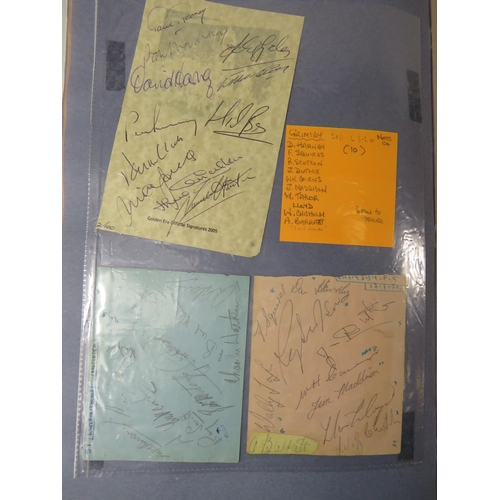 69 - Two interesting and well filled football related scrapbooks containing many autographed pictures and... 