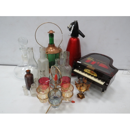 817 - Mixed lot to include decanters, jewellery box in the form of a piano etc.