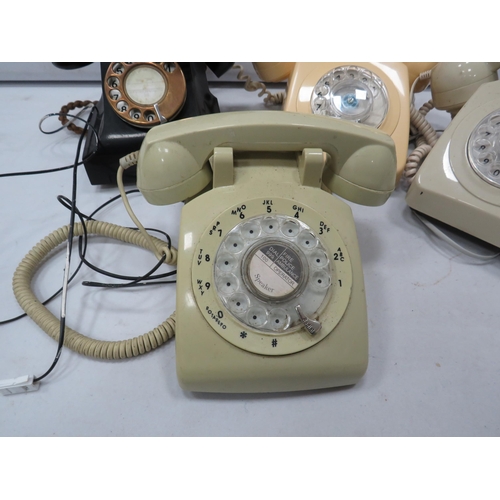 821 - 4 Vintage dial round telephones.