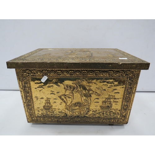 823 - Brass fire side log store box decorated with ships.