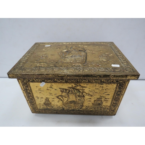 823 - Brass fire side log store box decorated with ships.