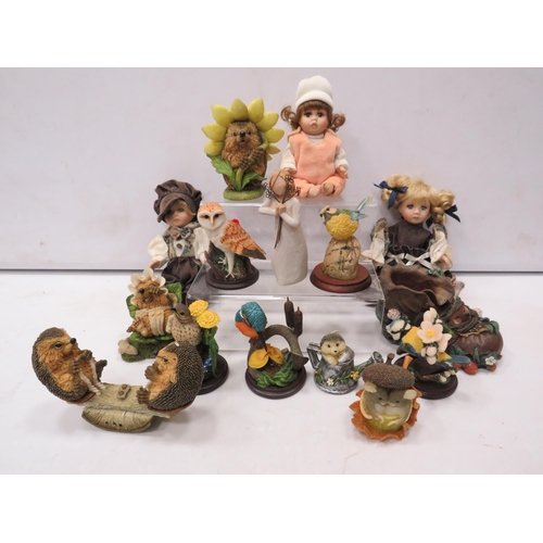 832 - Selection of various animal & bird figurines and 3 small porcelain dolls.