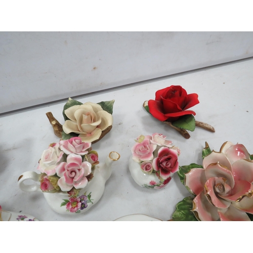 879 - Selection of various Capodimonte porcelain flowers, Royal albert posies etc.