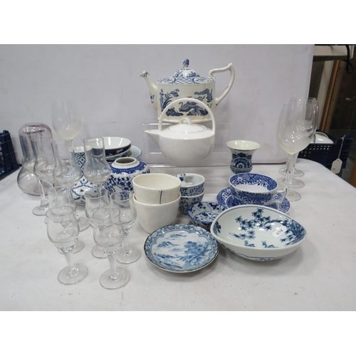 884 - Selection of blue and white ceramics and wine glasses.