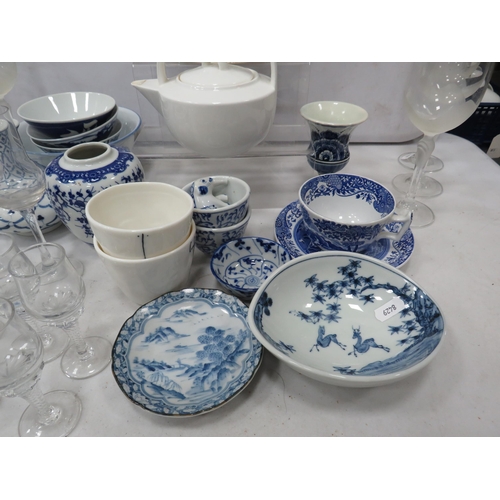 884 - Selection of blue and white ceramics and wine glasses.