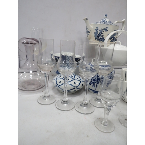 884 - Selection of blue and white ceramics and wine glasses.