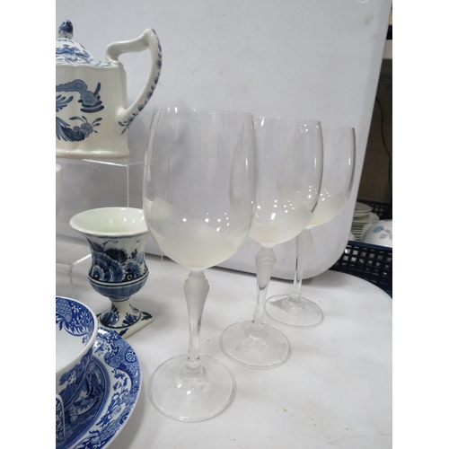 884 - Selection of blue and white ceramics and wine glasses.