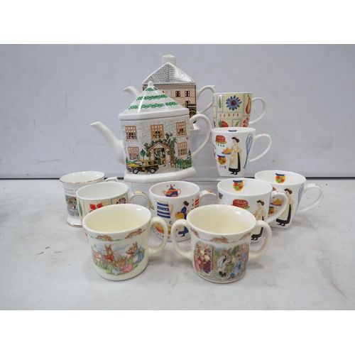 916 - 2 Ringtons Teapots 6 ringtons mugs and 2 Doulton bunnykins cups.