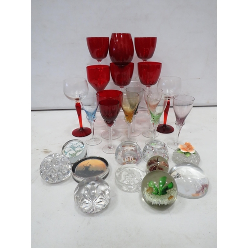 927 - Good selection of various wine glasses and paperweights.