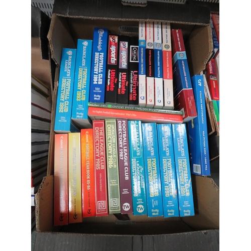 931 - 2 boxes of various football related books.